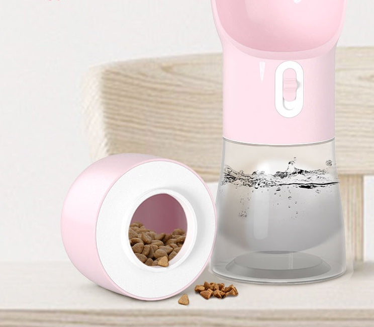 Pink pet water bottle and food container for long dog walks 