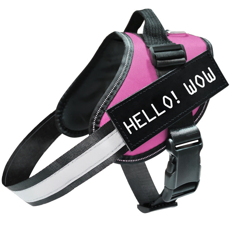 Pink dog harness with a black label saying 'HELLO! WOW' on a white background