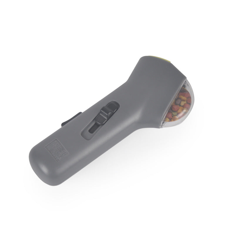 Gray handheld device with a transparent container on a white background
