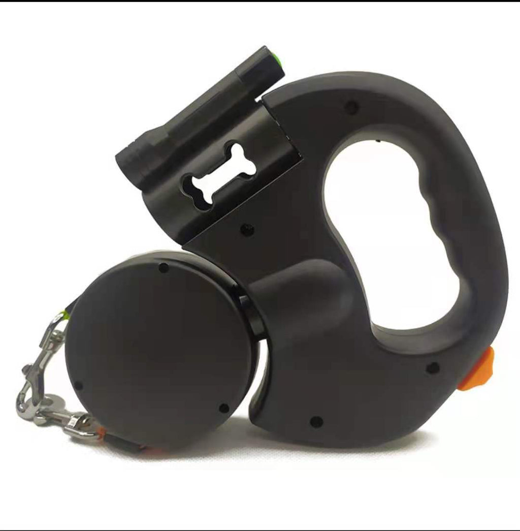 Black retractable dog leash with keychain on a white background