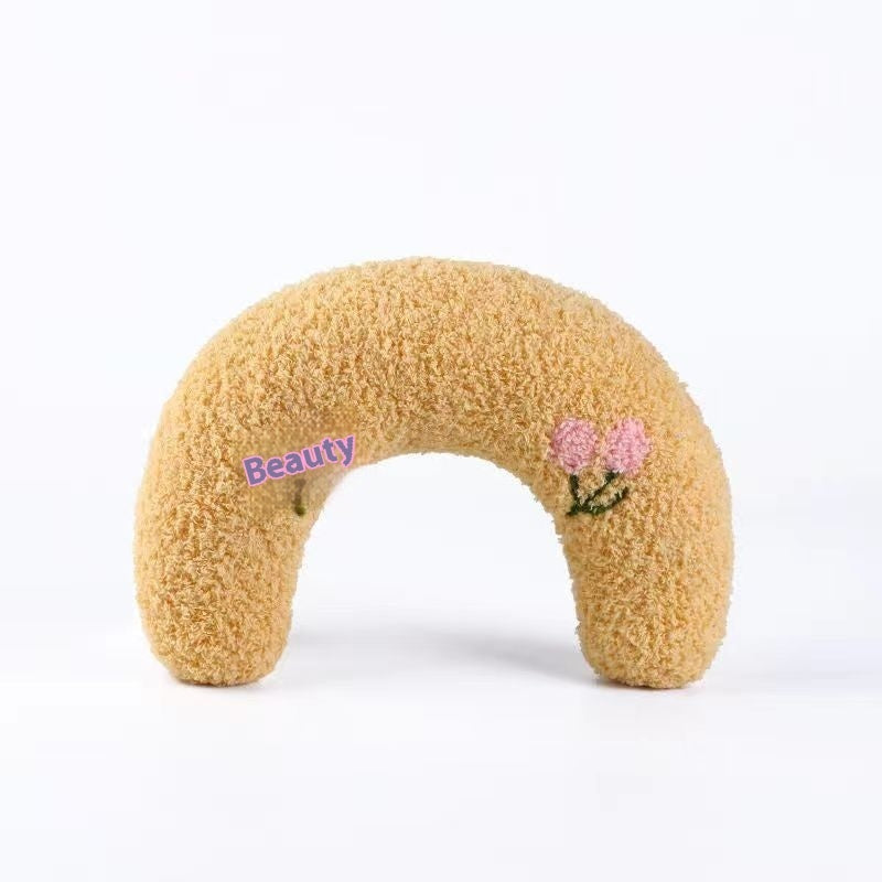 Beige comfortable pet bed U-shaped pillow mat for neck support dogs and cats