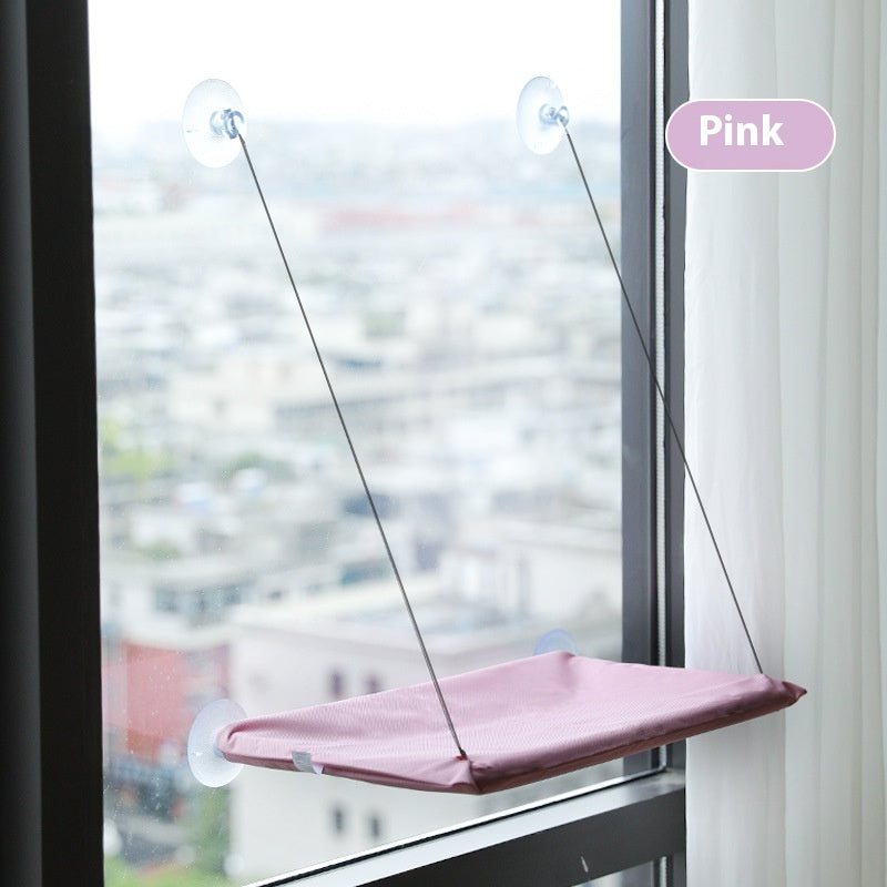 Pink indoor cat sun perch hammock with secure suction cups for window